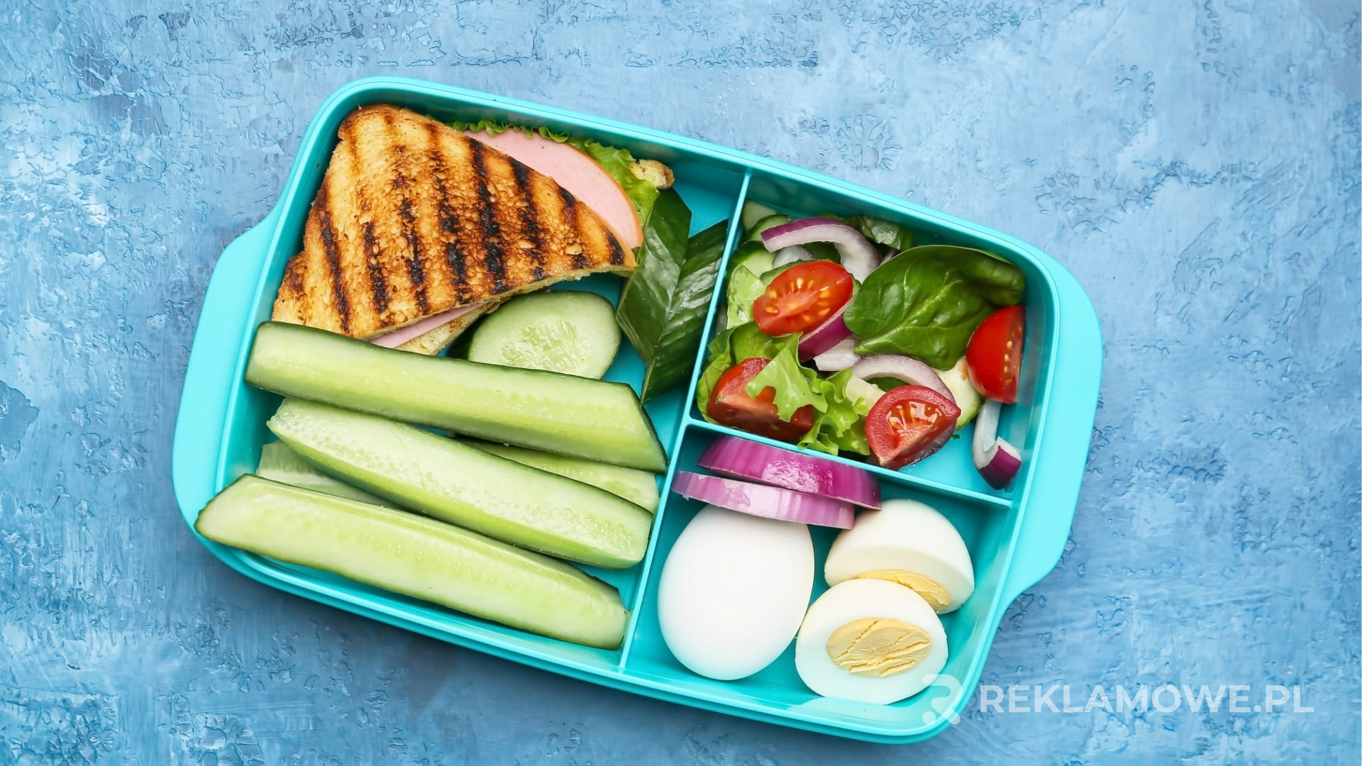 Lunchbox reklamowy w użytku podczas kampanii marketingowej